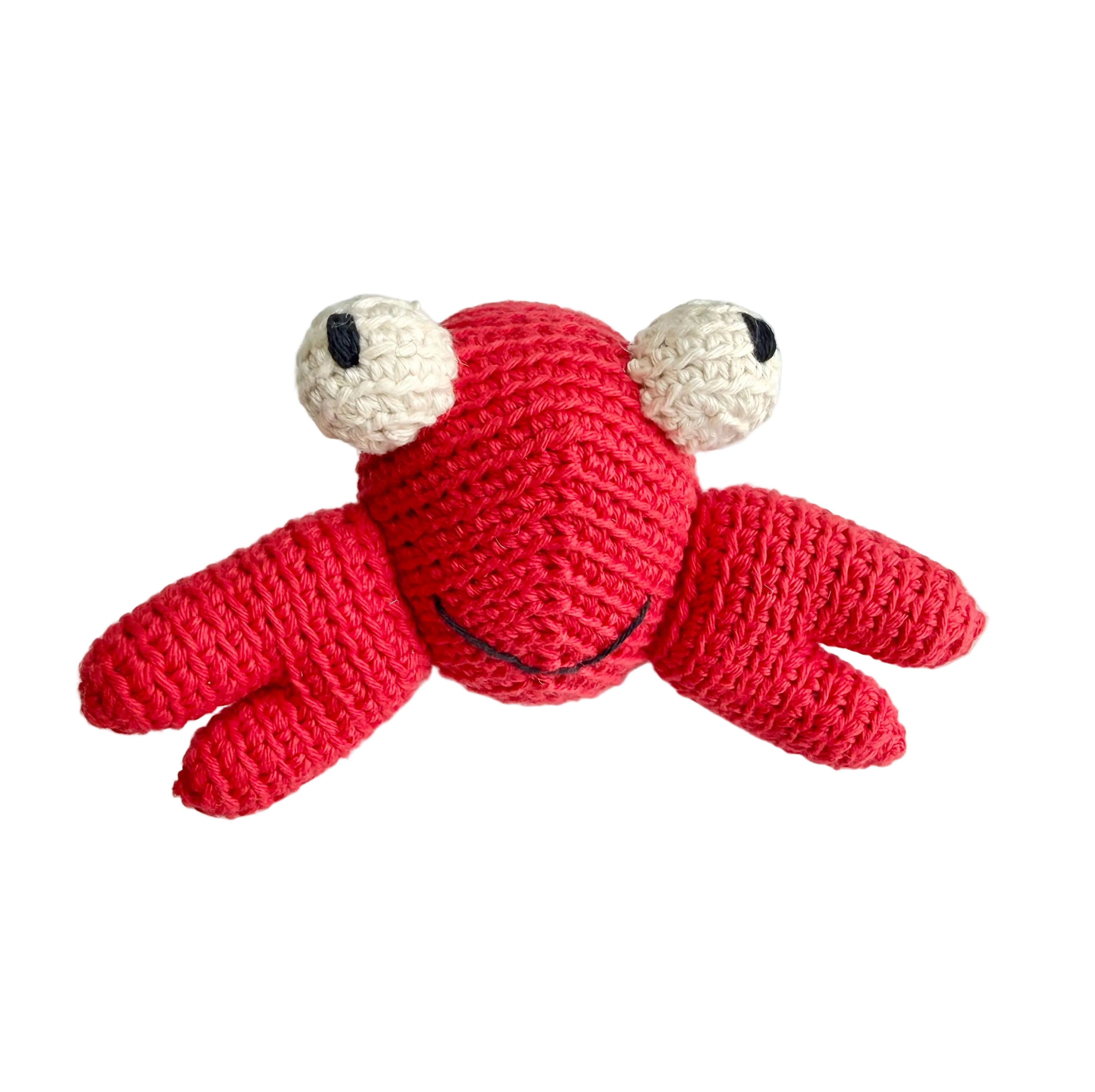Crab soft plush toy with squeaker, red crab design with claws, sold by stitch + tail