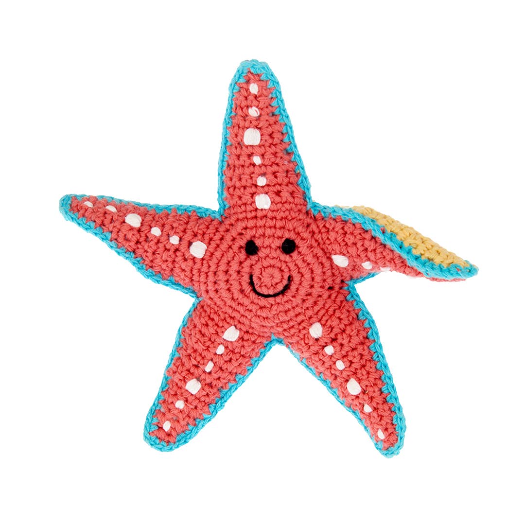 Starfish soft plush toy with squeaker, bright star-shaped sea creature design, sold by stitch + tail