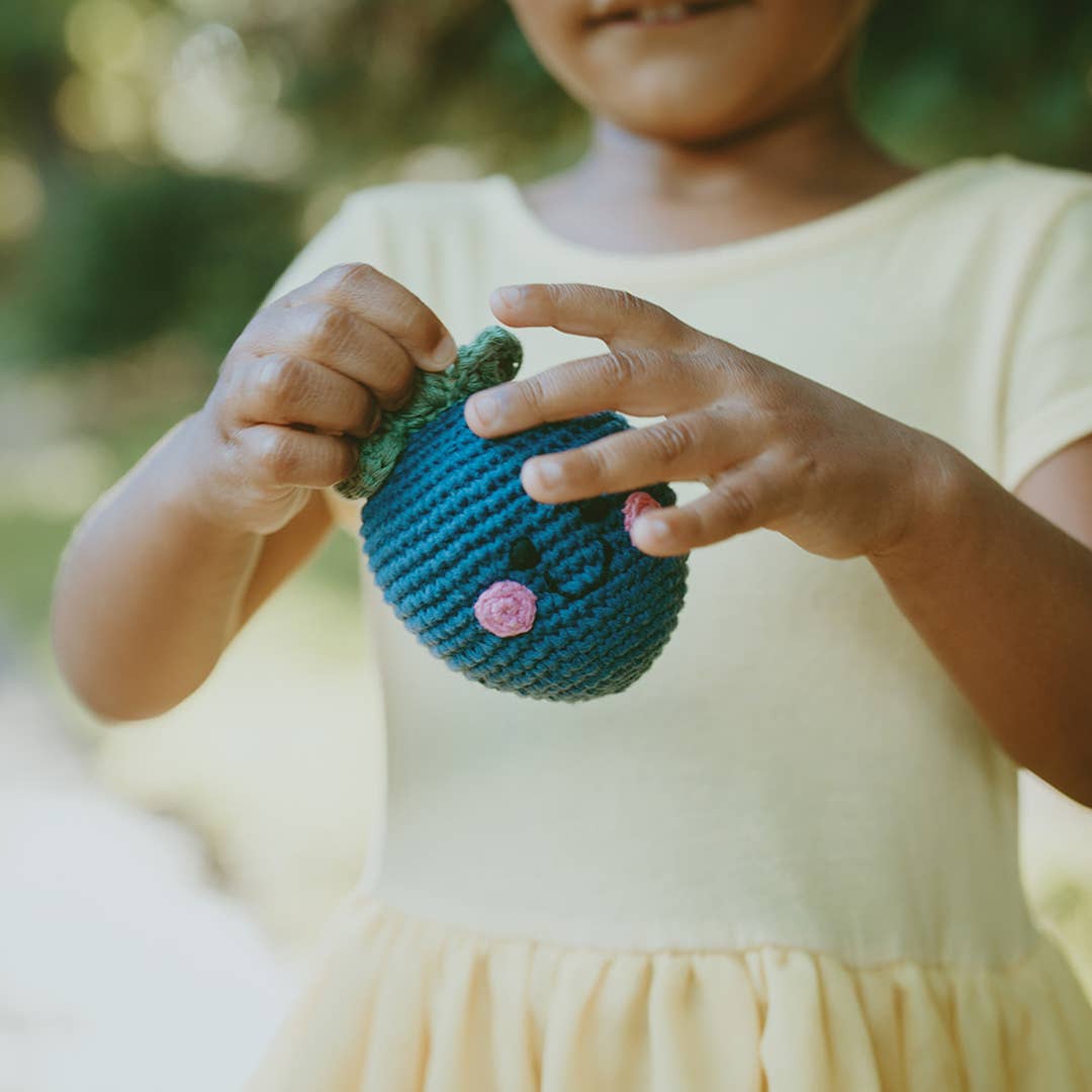 Blueberry soft plush toy with squeaker, round blue fruit design with leafy top, sold by stitch + tail