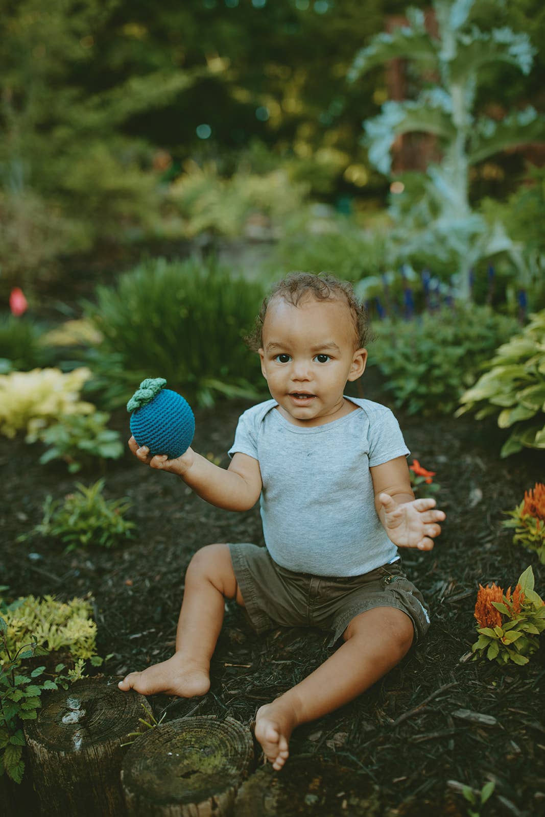 Blueberry soft plush toy with squeaker, round blue fruit design with leafy top, sold by stitch + tail